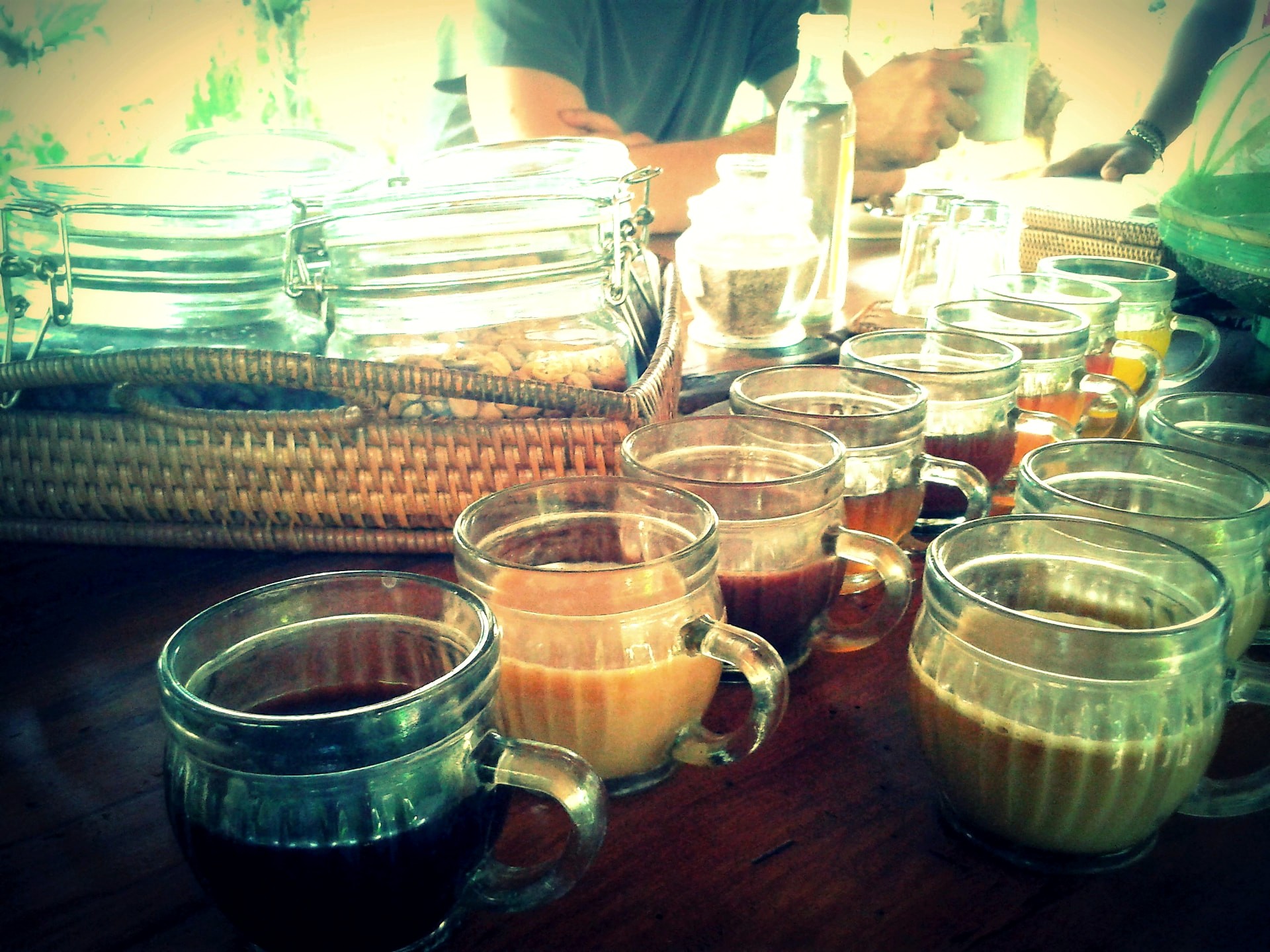 A tasting flight of Balinese coffees and teas in glass cups