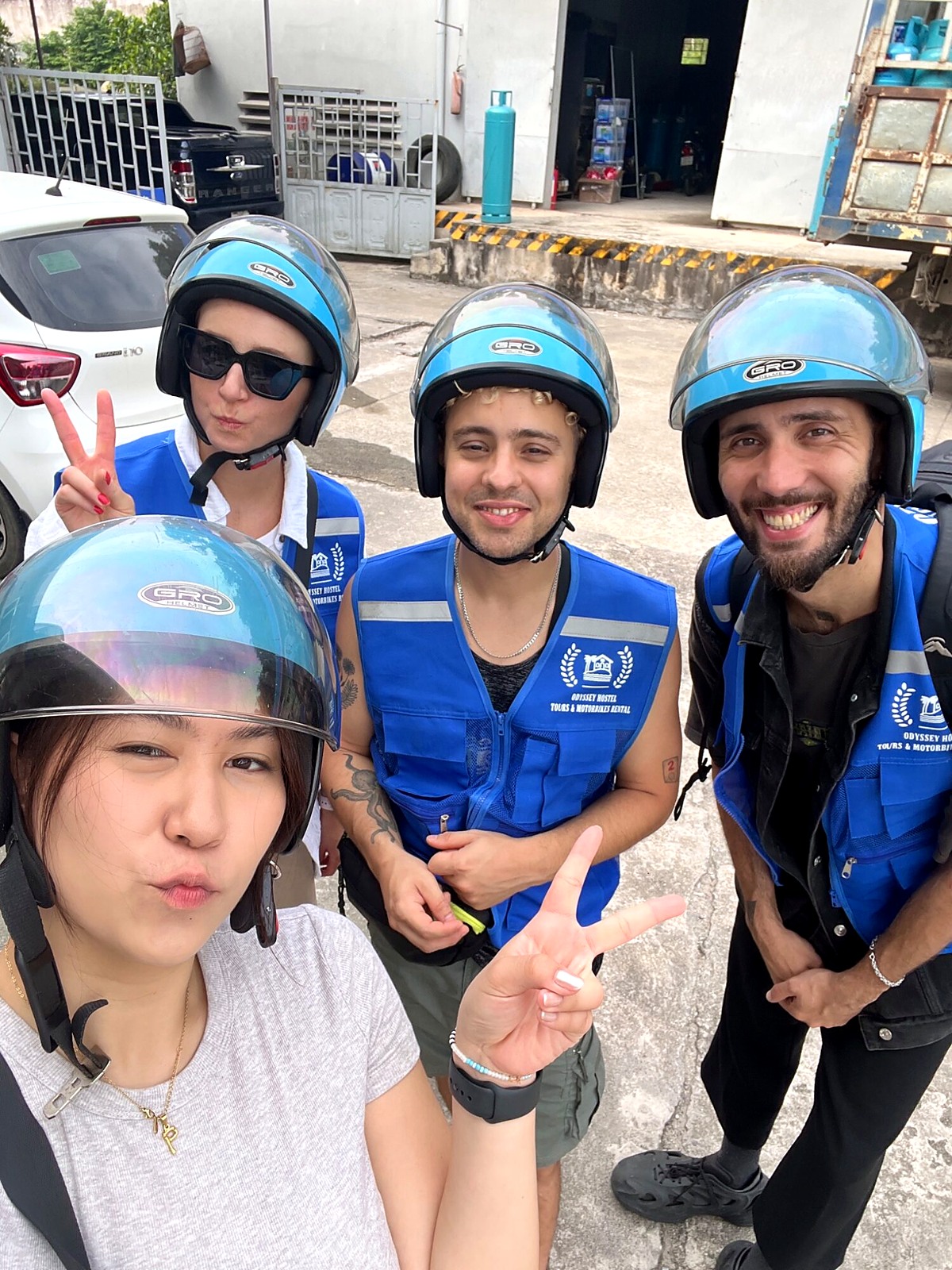 Travellers and easy riders smiling together in their helmets