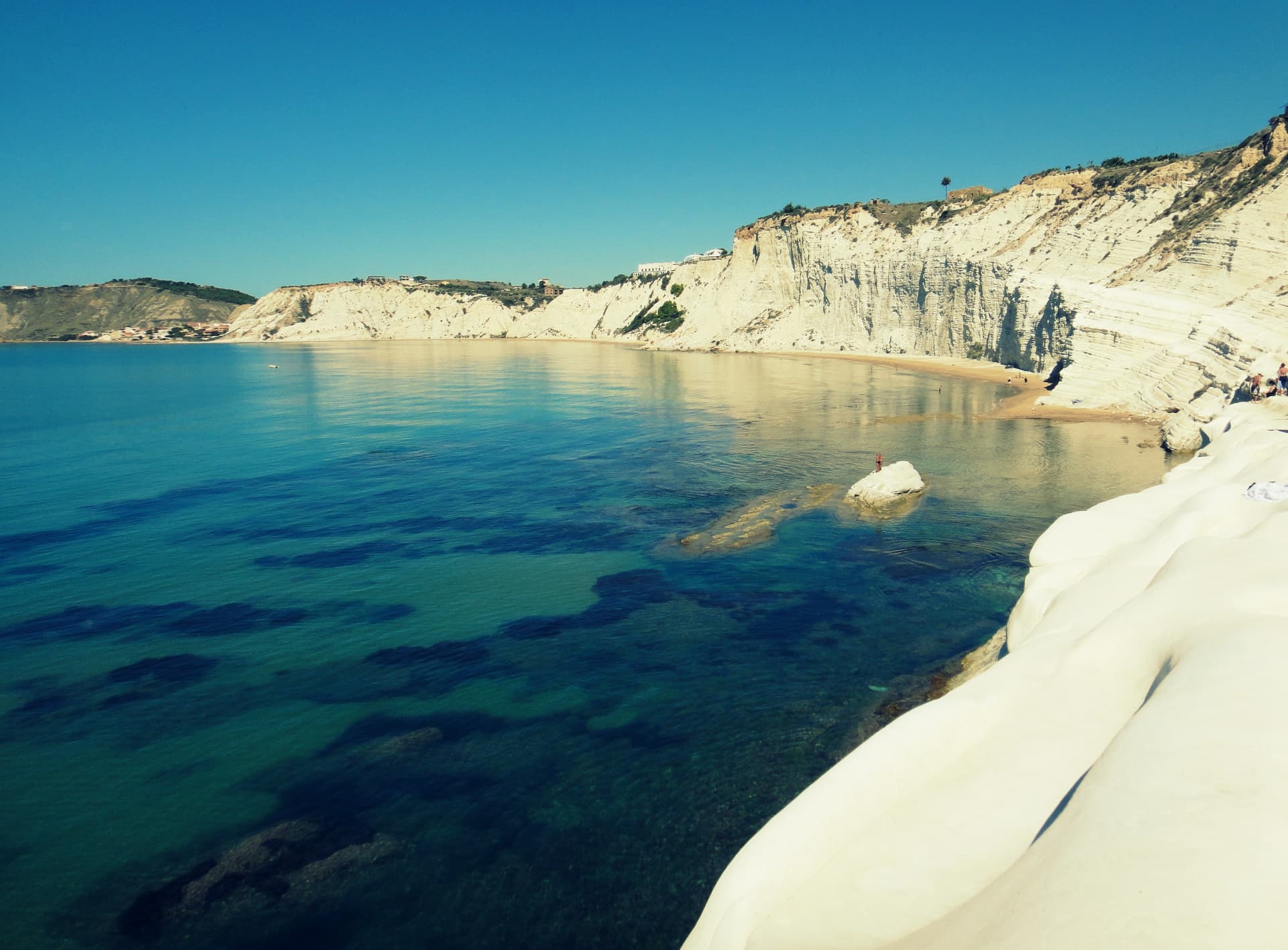 The white stepped cliffs of Scala dei Turchi above turquoise water near Agrigento