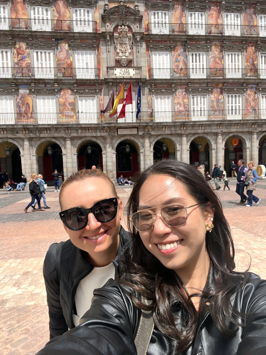 Two friends in front of Plaza Mayor in Madrid